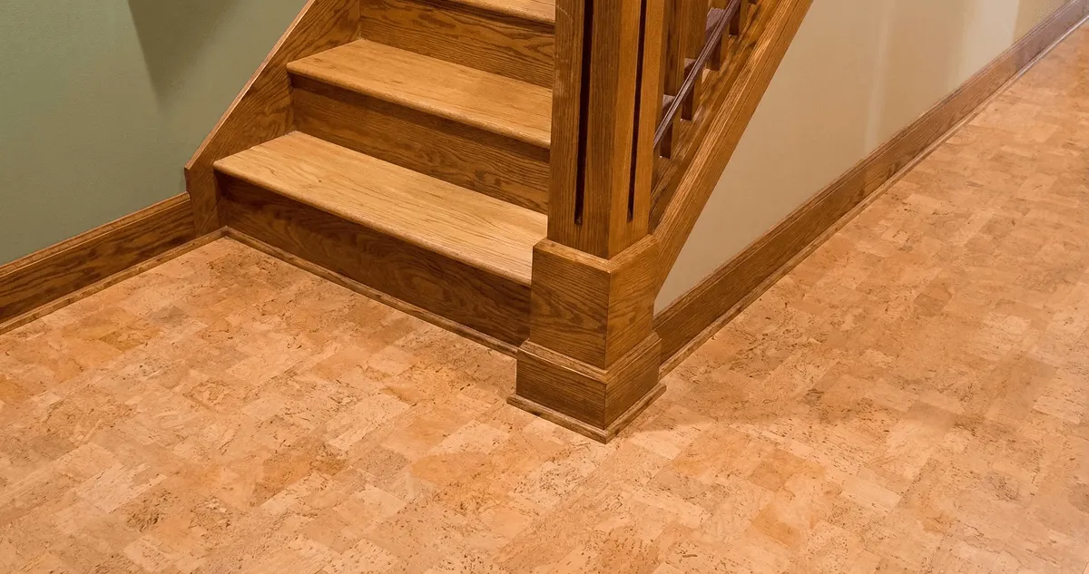 End of a staircase with cork flooring in Colorado Springs, CO