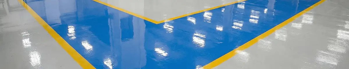 A factory floor professionally covered and marked with epoxy flooring in Colorado Springs, CO