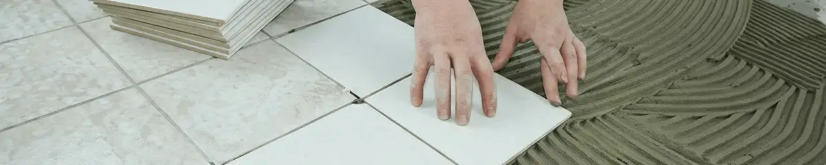 Professional installing white tile floors in Colorado Springs, CO